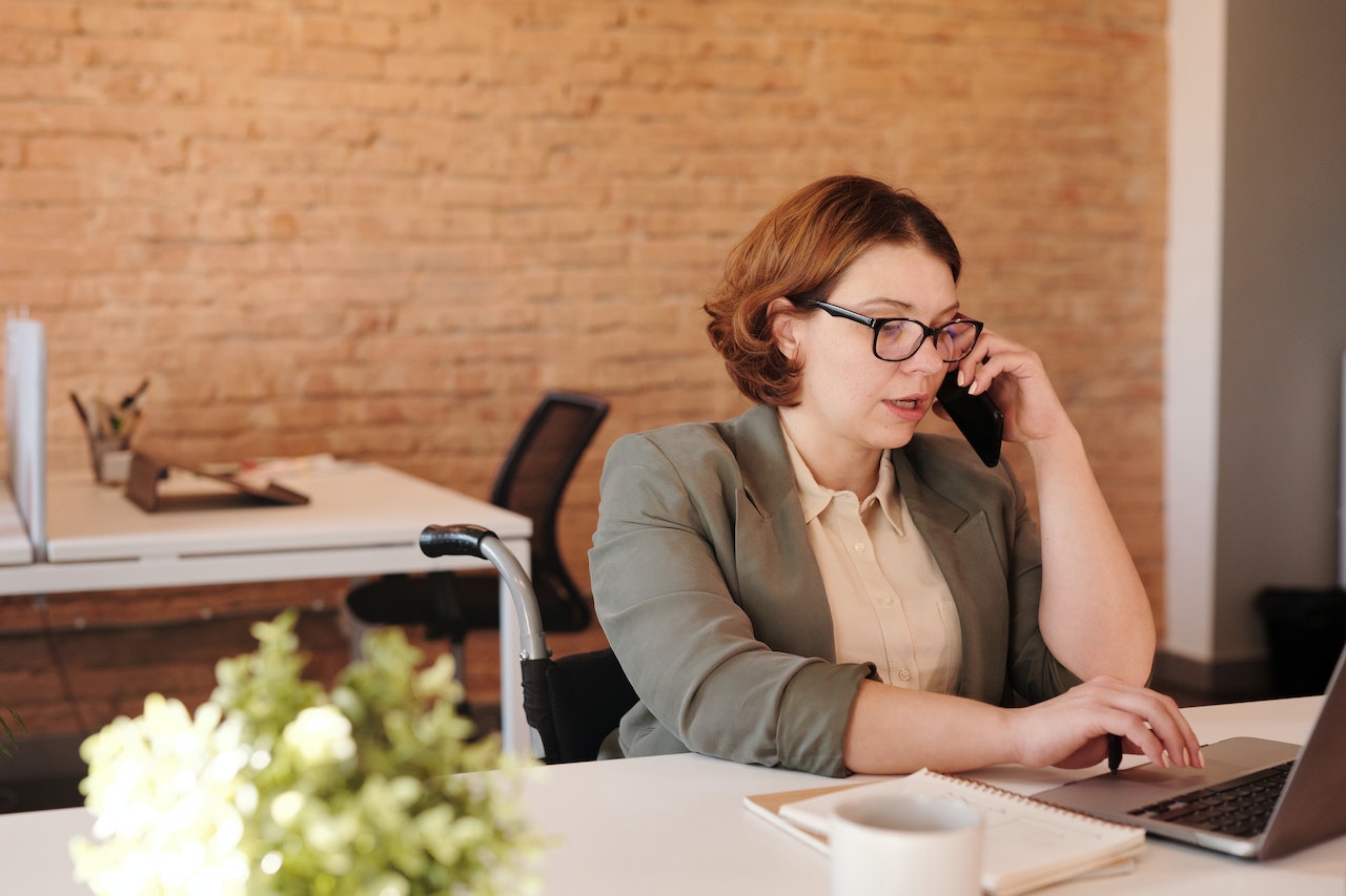 Busy professional woman at her workplace