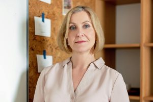 Creating Habits with ADHD - confident woman posing in the office