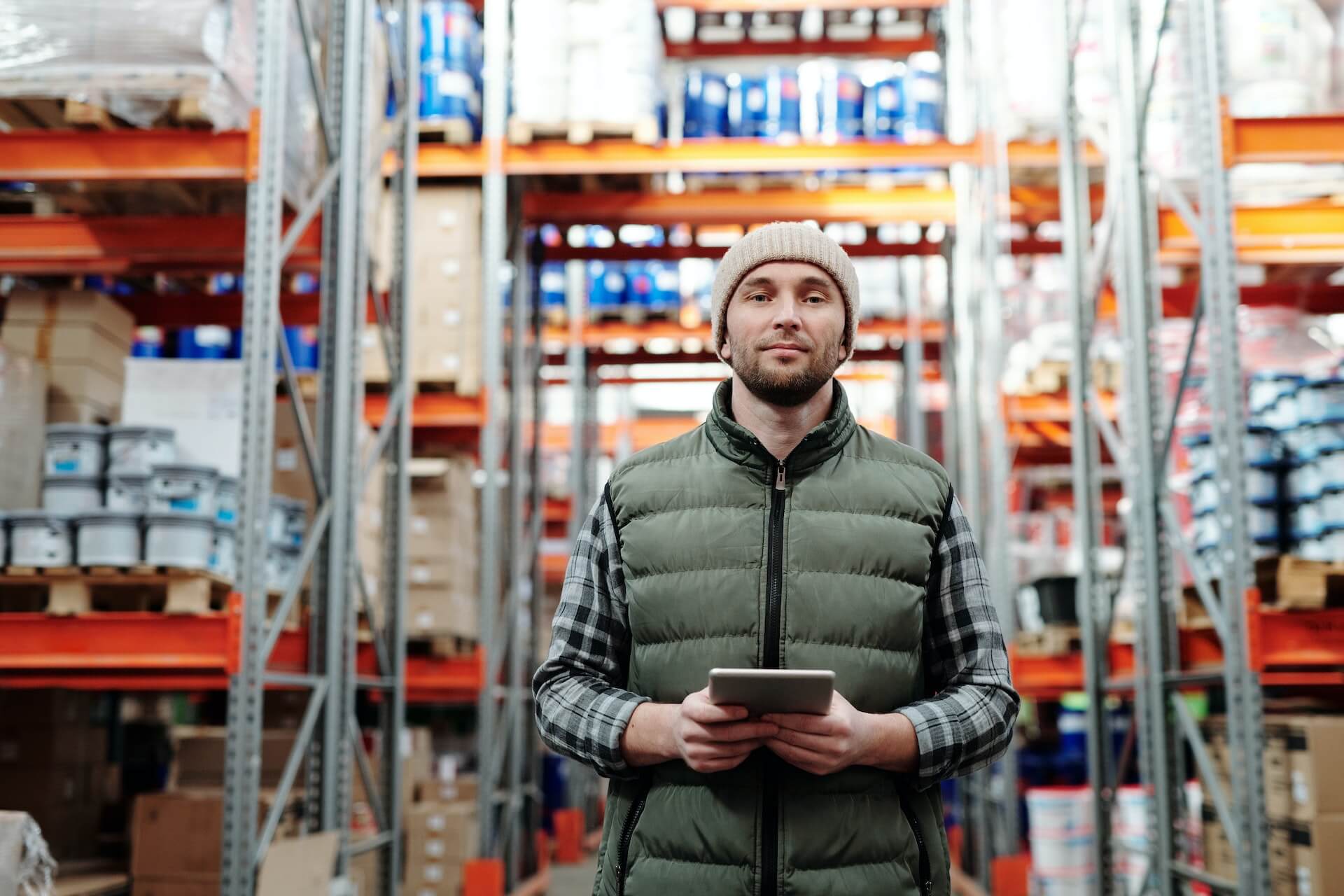 man with tablet at a warehouse