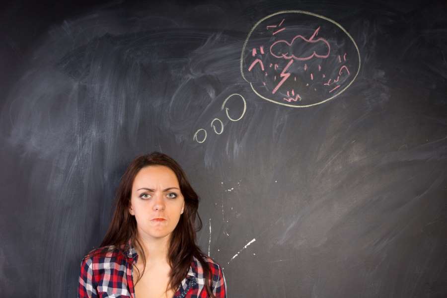 what is the best way to deal with emotional dysregulation - woman in front of blackboard